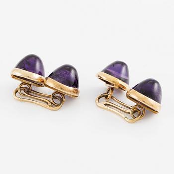 A pair of cufflinks 14K gold and amethysts.