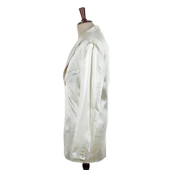 DOLCE & GABBANA, a creamecolored crocodile embossed men´s evening jacket, size 48.