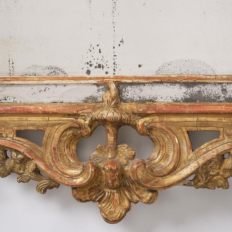 A Swedish Rococo mirror, 18 th century.