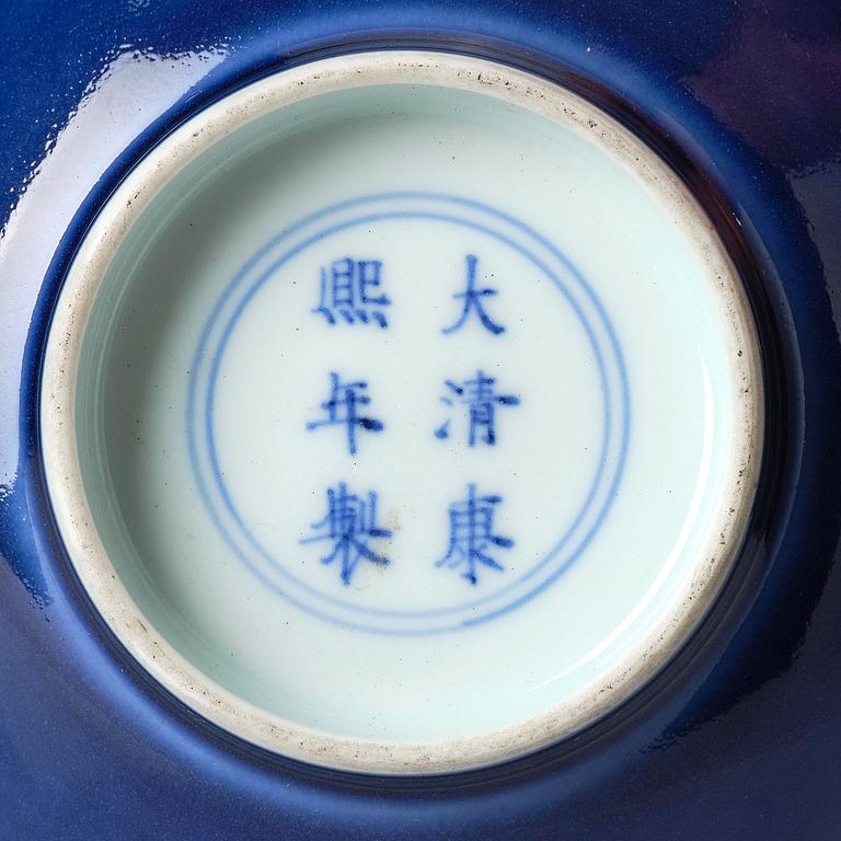 A blue glazed bowl, Qing dynasty with Kangxi mark and of the period (1662-1722).