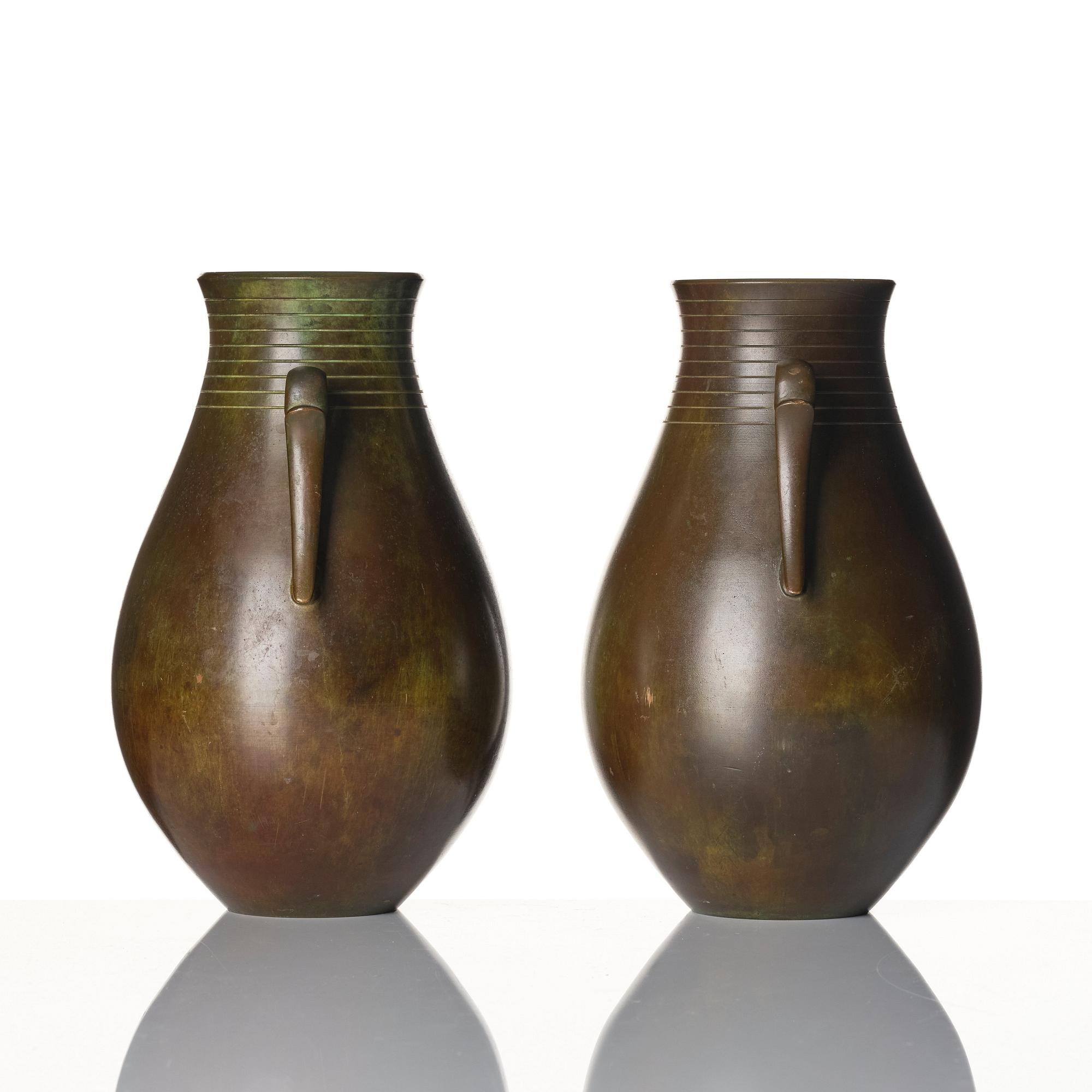 Guldsmedsaktiebolaget (GAB), a pair of Swedish Grace bronze vases, probably designed by Jacob Ängman.