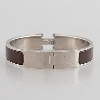 Hermès, a 'Clic H' bracelet.