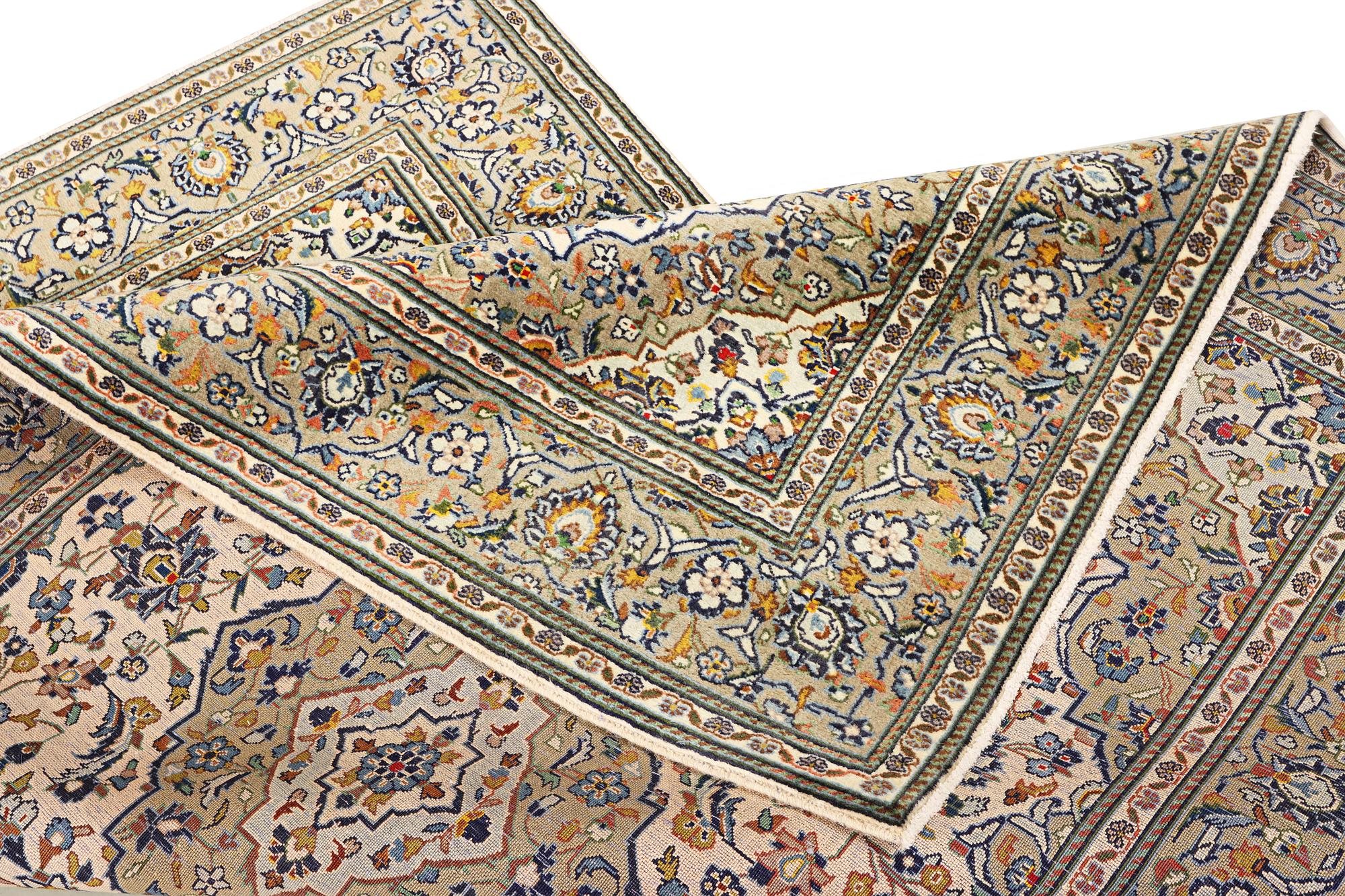 A Kashan rug, a. 208 x 135 cm.