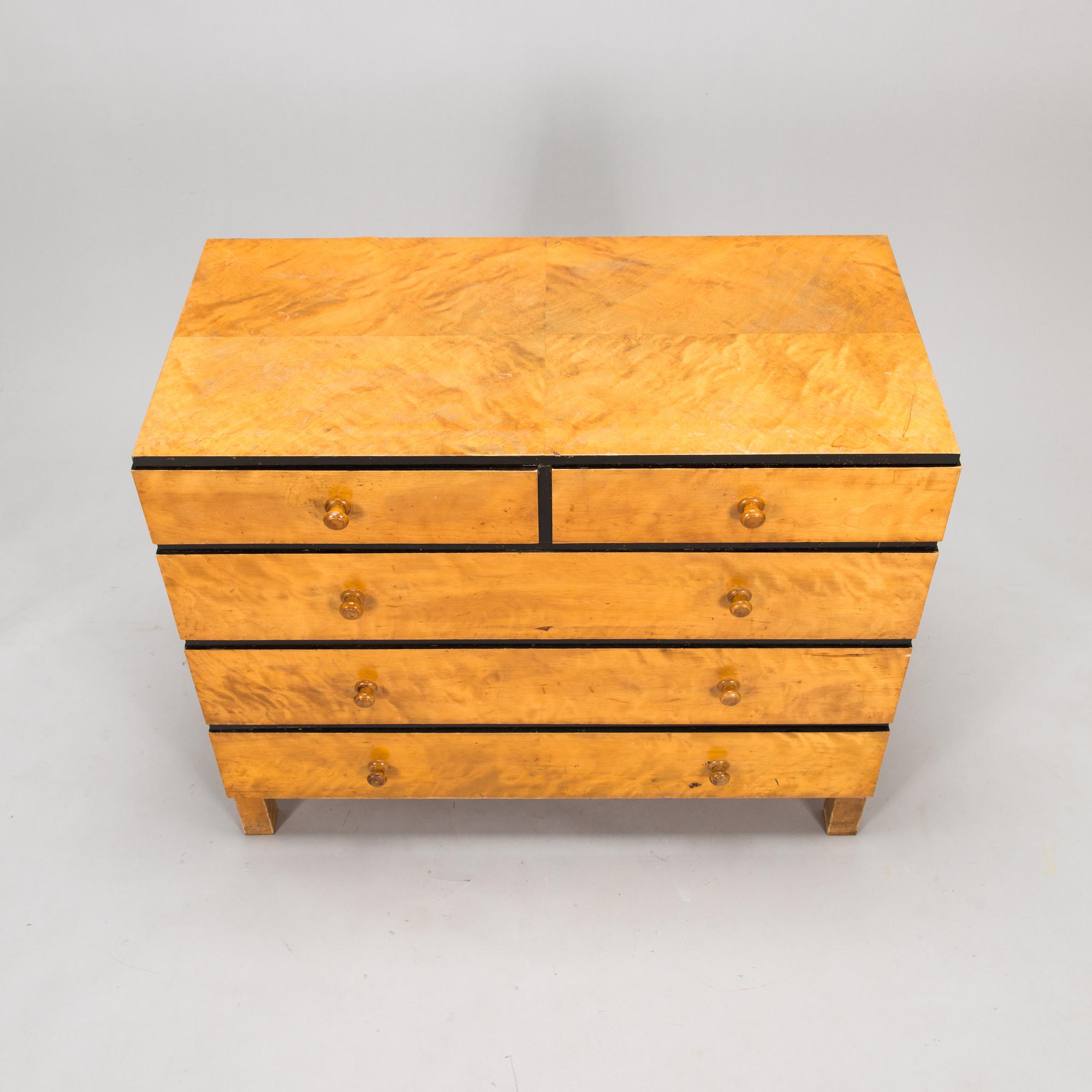 A 1930s chest of drawers.