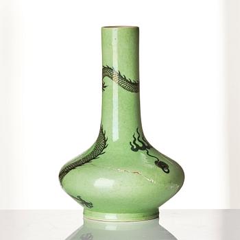 A green glazed vase with a five clawed dragons, Qing dynasty, Kangxi (1662-1722).