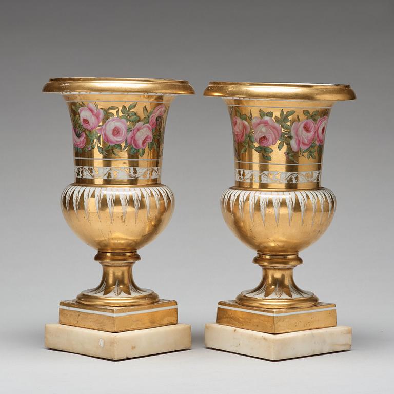 A pair of French urns, 19th Century.