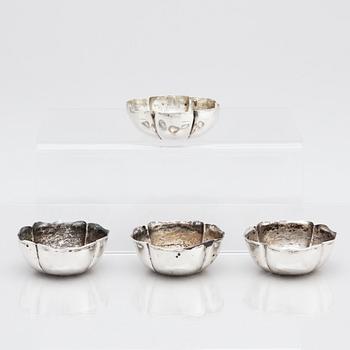 A set of four (3+1) Chinese lowgrade silver bowls, Qing dynasty.