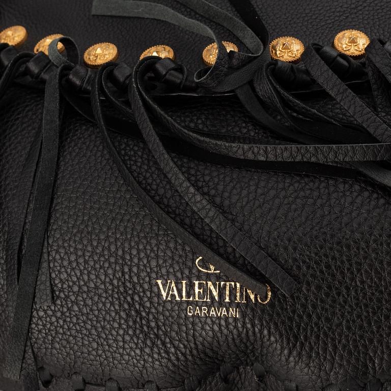 Valentino, a black leather hobo bag.