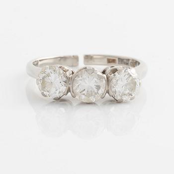 Ring with three brilliant-cut diamonds.