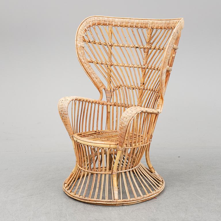 GIO PONTI & LIO CARMINATI, A 'Conte Biancamano' rattan Wingback Armchair for Bonacina, Italy.