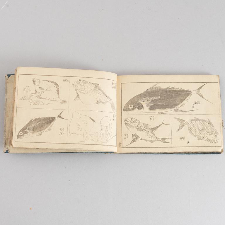A group of five Japanese albums, including Katsushika Isai and Utagawa Kunisada, Meiji (1868-1912).