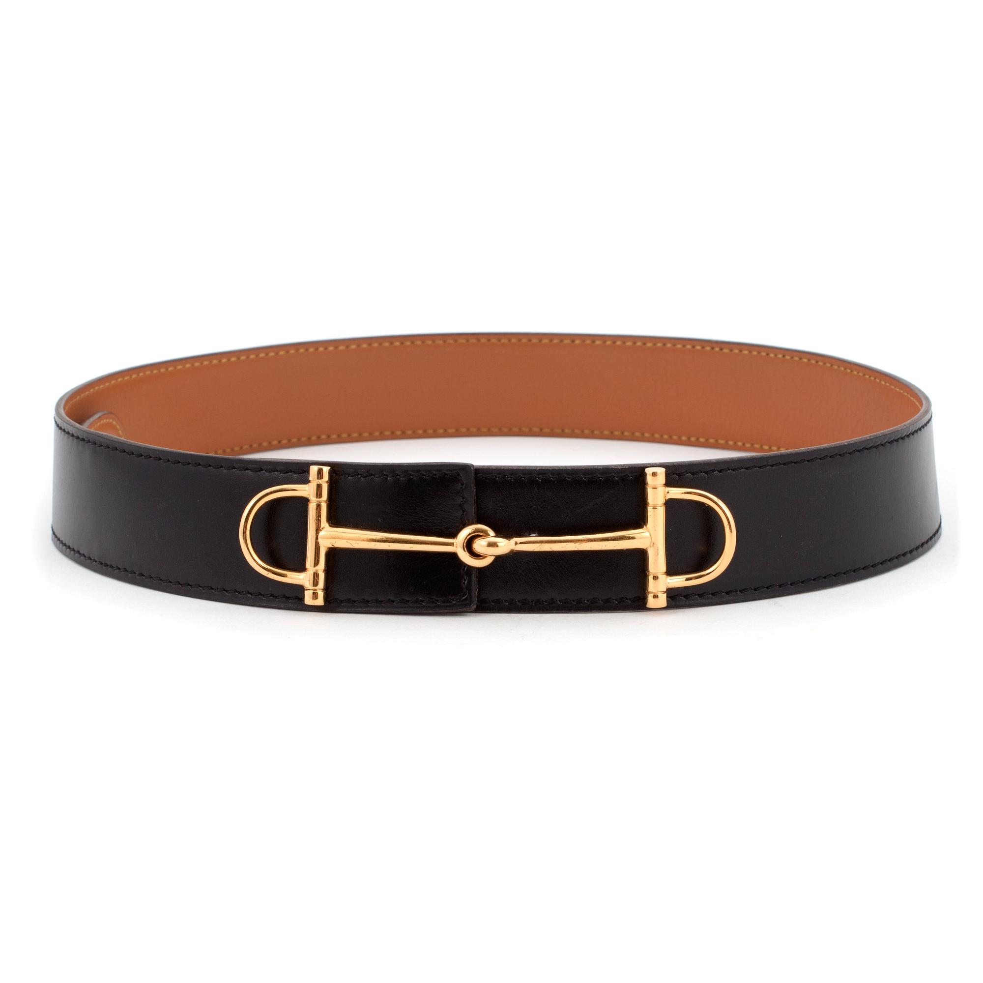 HERMÈS, a black leather belt.