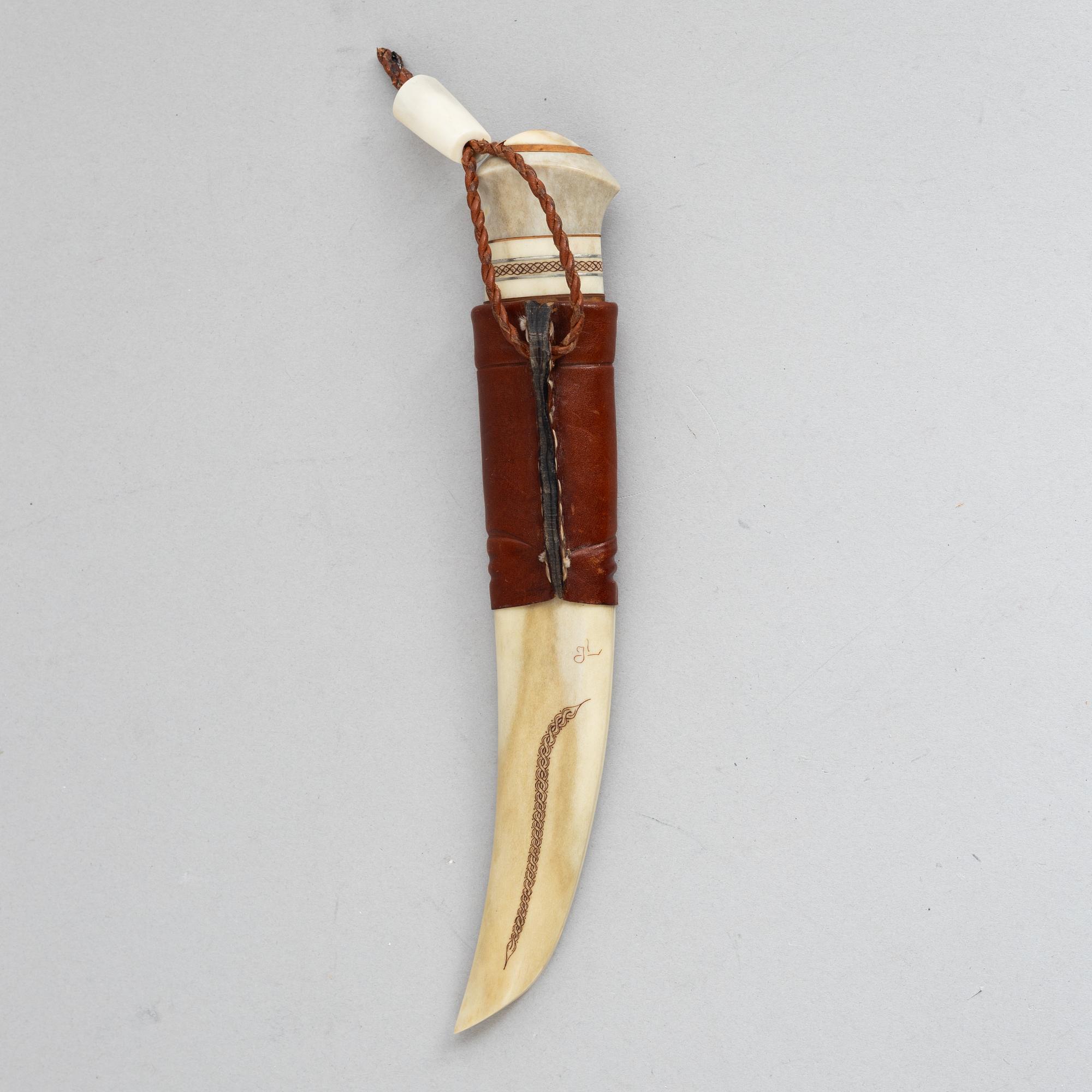 Jan Lindfors, a reindeer antler knife, signed JL.