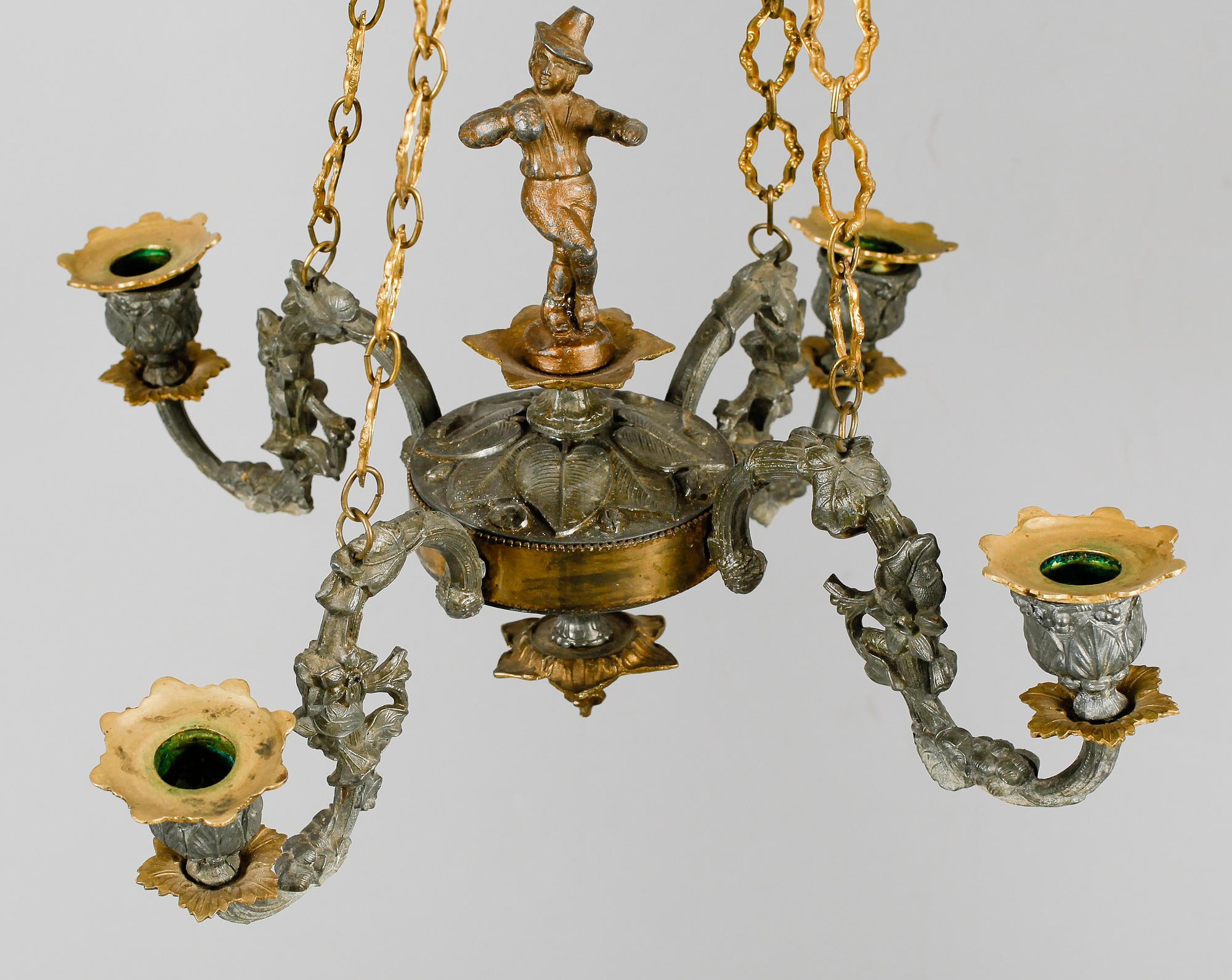 TAKAMPEL, patinerad metall och mässing, 1800-tal. Diam 40.
