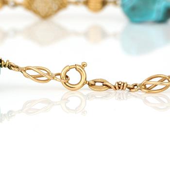 HALSBAND, 18K guld med ofasetterade turkoser.  Total vikt ca 36 g.