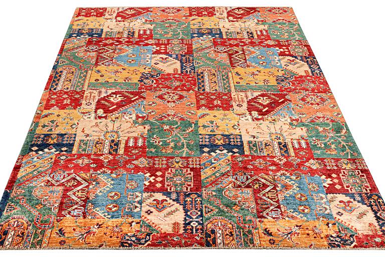 A Kazak carpet, c. 296 x 209 cm.