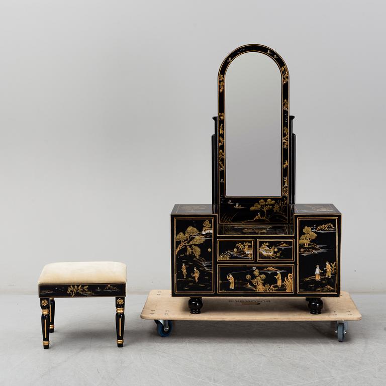 A Chinese lacquered dressing table and stool, 20th century.