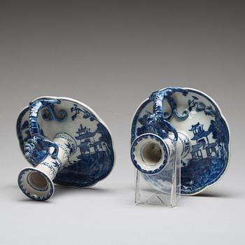 A pair of blue and white candle sticks, Qing dynasty, Qianlong (1736-95).