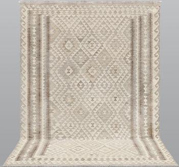 A Kilim carpet, c. 252 x 175 cm.