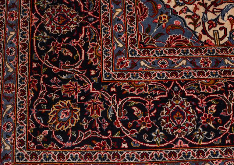 A Keshan rug, 405 x 295 cm.