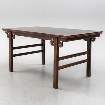 A Chinese wooden table, 20th century.