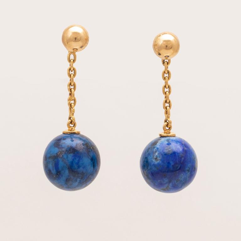 A set of lapis lazuli earrings and necklace.