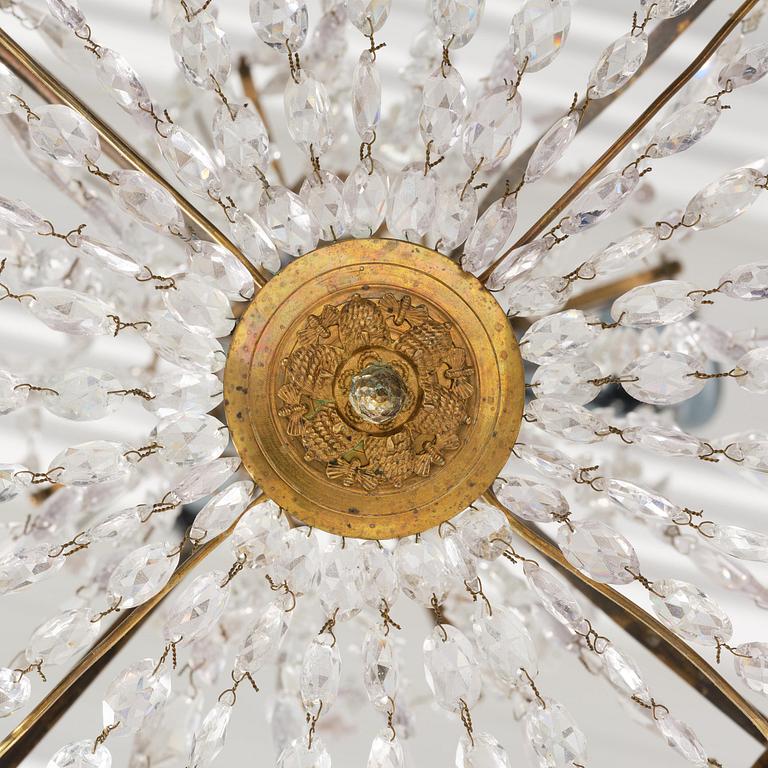 A late-Gustavian five-light gilt brass and cut glass chandelier, Stockholm, circa 1800.