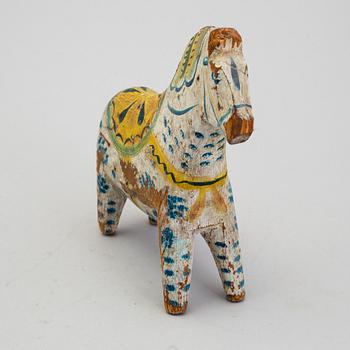 A painted folk art dala horse first half of the 20th century.