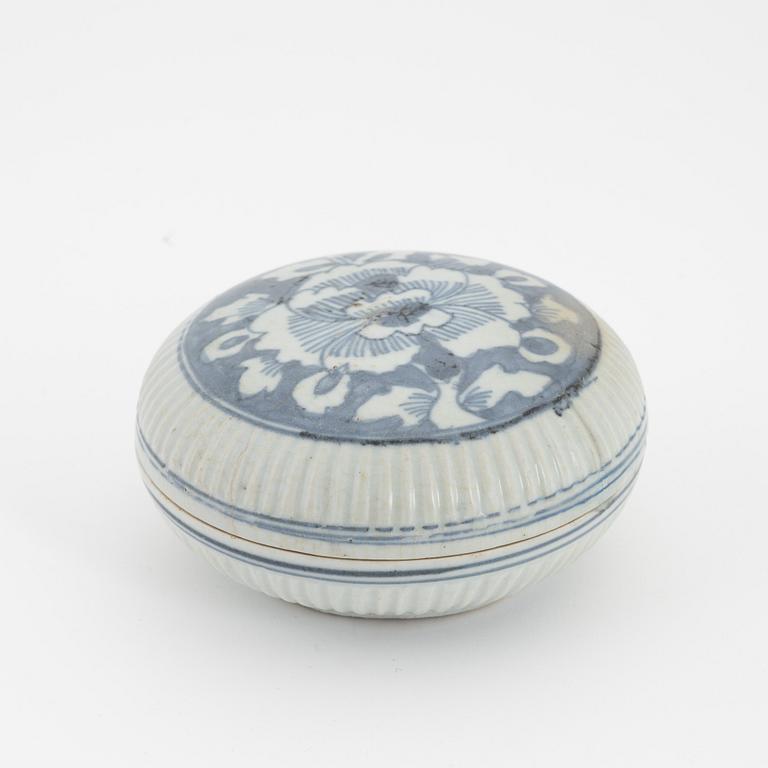 A Chinese blue and white box with cover, Ming dynasty, 17th century and three bowls, Southeast Asia, 19th/20th century.