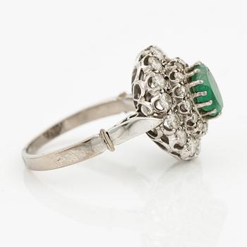 Ring, with emerald and brilliant-cut diamonds.