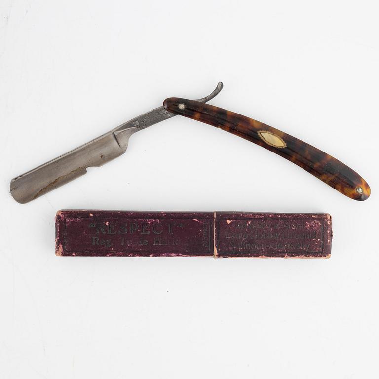 An early 19th century mahogny-veneered box for shaving utensils.