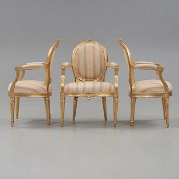 Three Gustavian armchairs by E Öhrmark, master 1777.