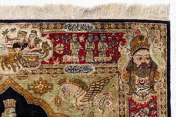 A pictorial semi-antique silk Qum rug, central Persia, c. 214 x 146 cm.