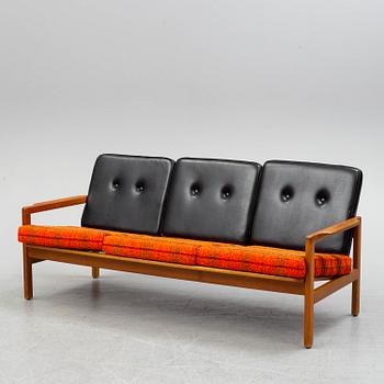 A 1960s sofa and easy chair.