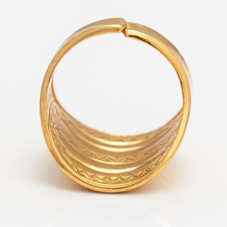 A gold plated bronze ring "Perniö-ring", model 111. Kalevala Koru, Helsinki.