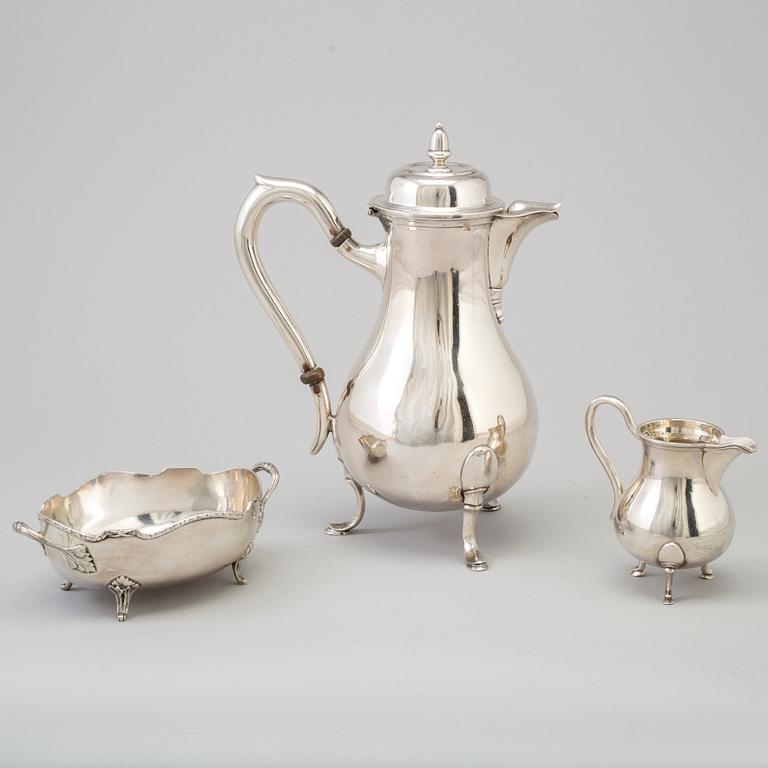 A three-piece silver coffee service from Borel & Co, Germany, mid 20th Century.
