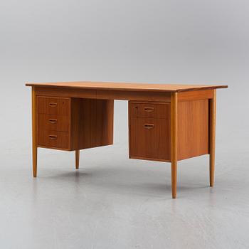 A 1950/60's oak and teak writing desk.