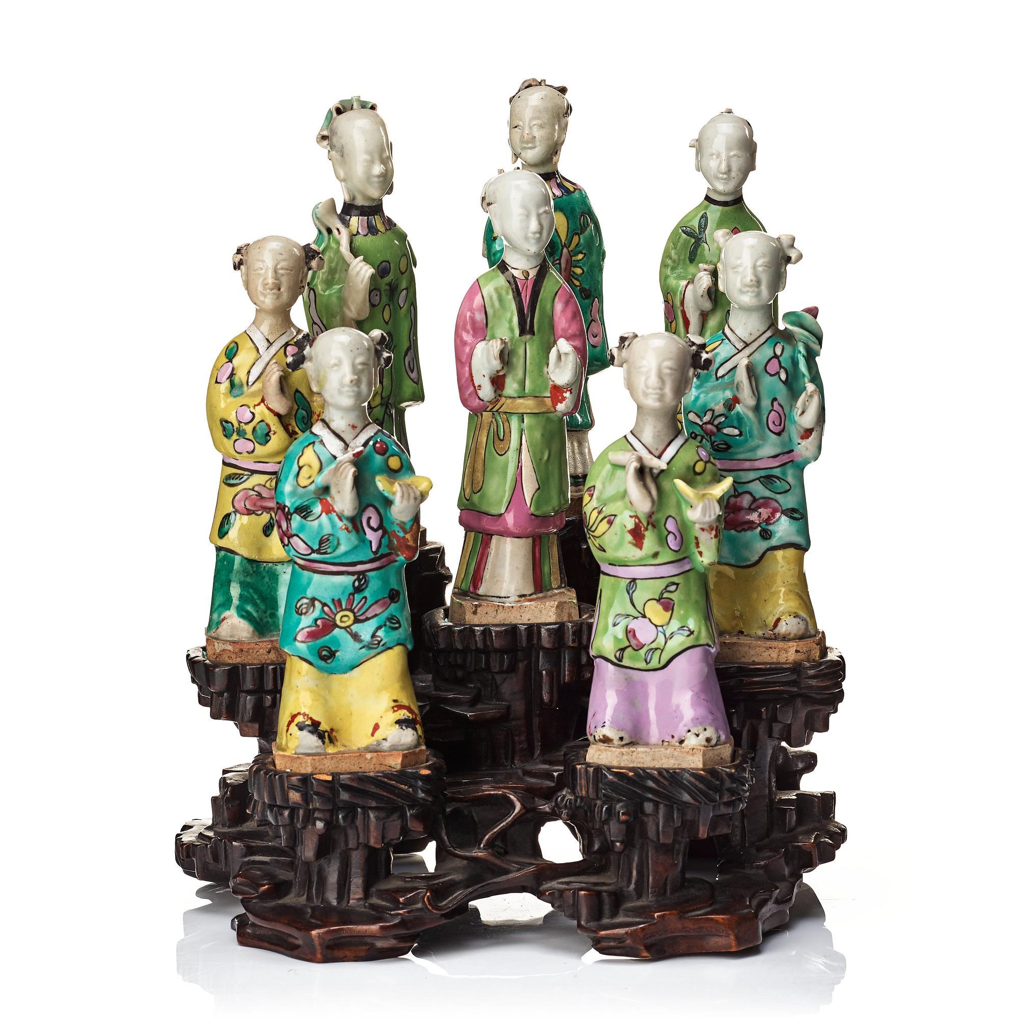 A group of eight immortals on  wooden stand, Qing dynasty, 19th Century.