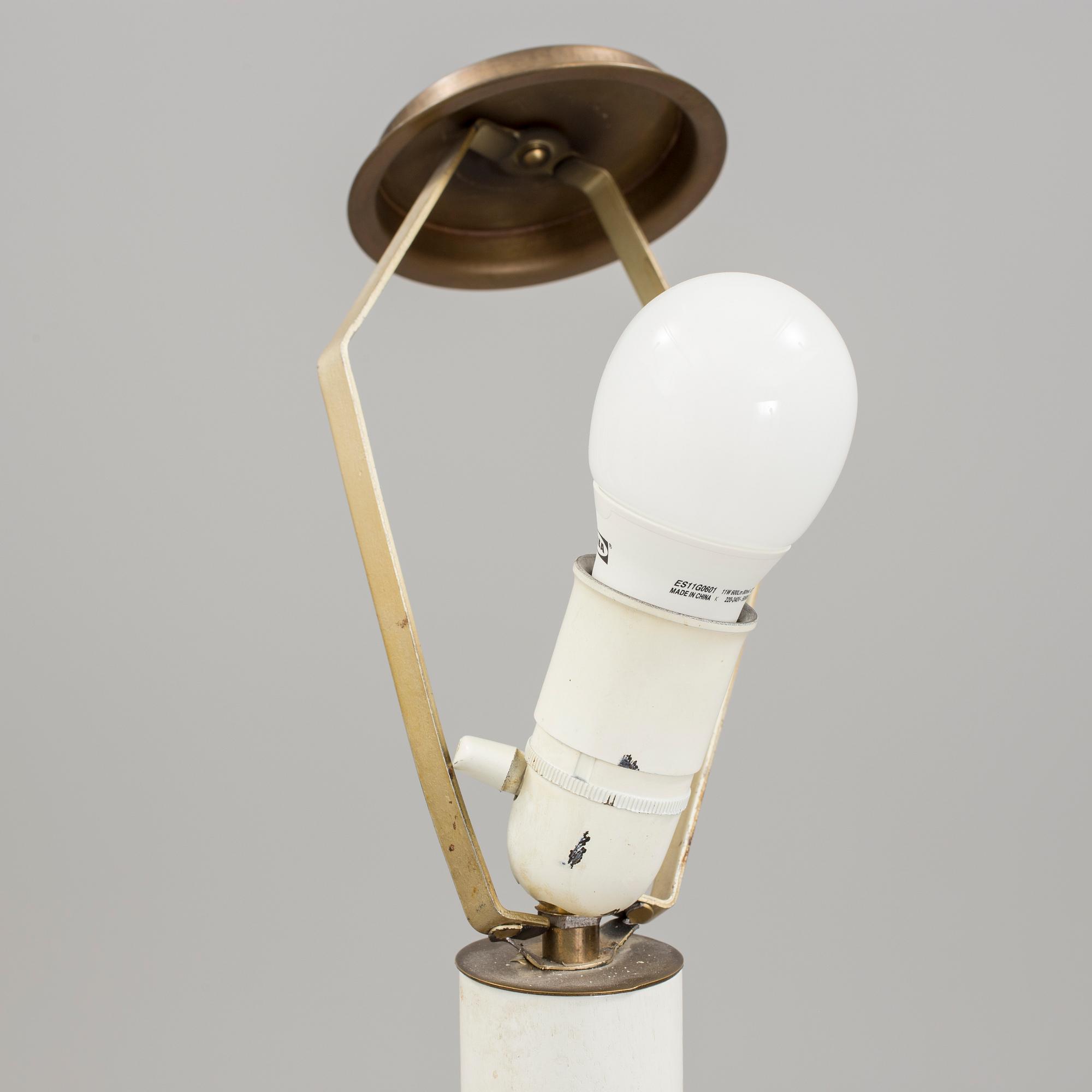 a early 20h Century brass floor lamp.
