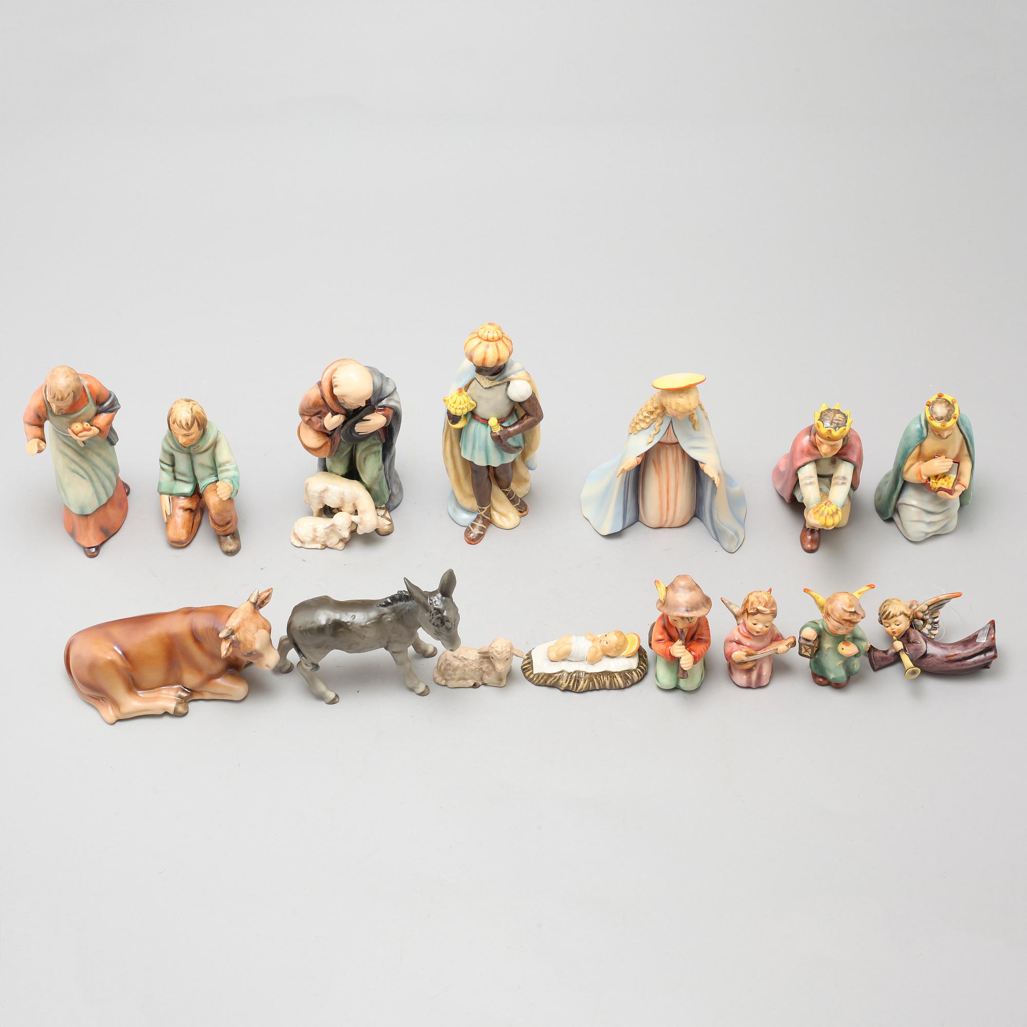 15 porcelain figurines, designed by MI Hummel for Goebel, late 20th century.