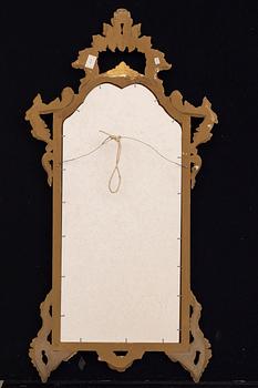 An mid 20th century wood mirror from Paoletti, Firenze Italy.