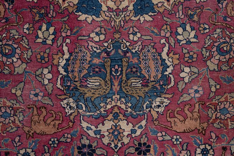 An antique Tabriz carpet, West Persia, c. 447 x 322 cm.