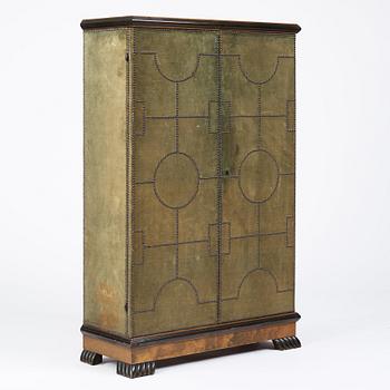 Otto Schulz, a velvet covered Swedish Modern cabinet, Sweden, late 1920s.
