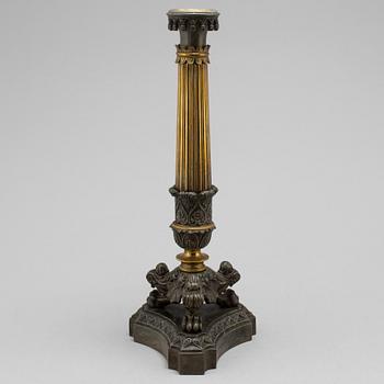 A mid 19th century late empire candlestick.