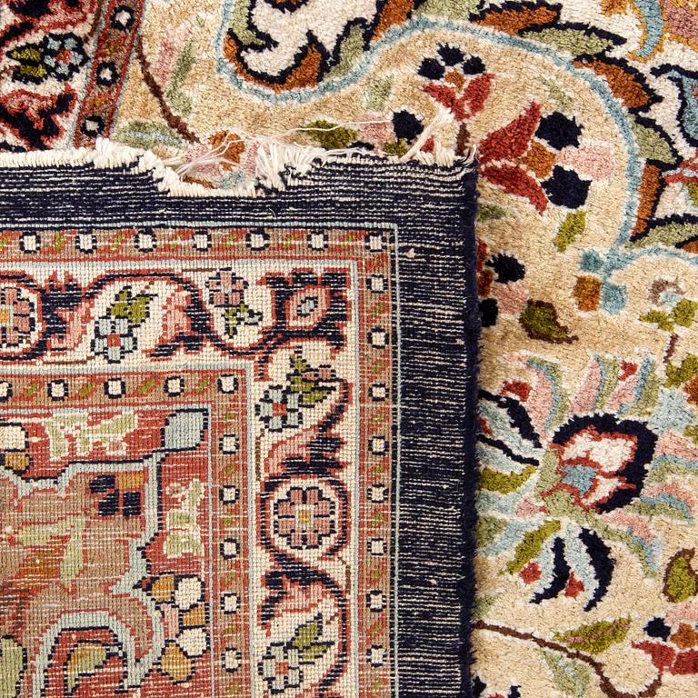 An old Ghom silk carpet ca 368 x 273 cm.