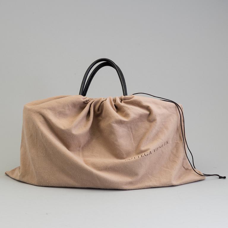 A bag by Bottega Veneta.