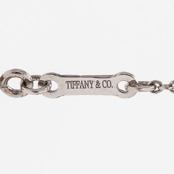 Tiffany & Co, Elsa Peretti, kaulakoru, risti, platinaa.