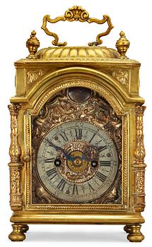 645. A Middle Europe 18th century brass mantel clock.