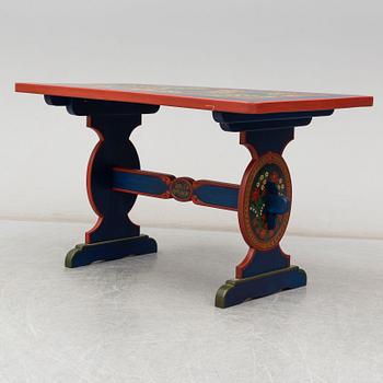 A second half of the 20th Century dining table and four chairs painted by the Hungrarian artist Laszlo Holló.