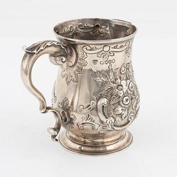 An English silver creamer, London, 1887.